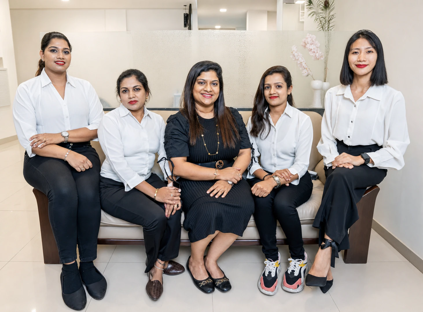 Dr. Sanjana Shivashankar with the Theory of Skin clinic team in Indiranagar